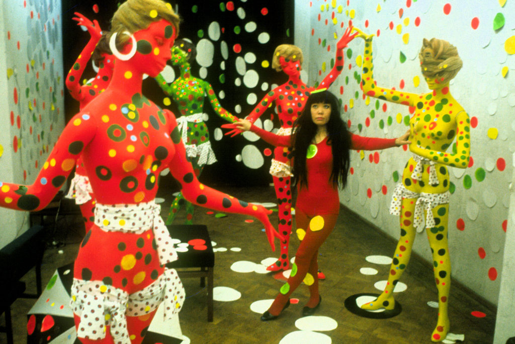 Artist Yayoi Kusama in the Orez Gallery in the Hague, Netherlands (1965) in Kusama - Infinity, directed by Heather Lenz. Photo credit: Harrie Verstappen. Courtesy of Magnolia Pictures.